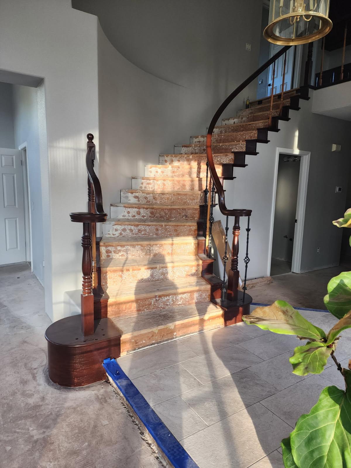 Luxury Curved Staircase — Hardwood before