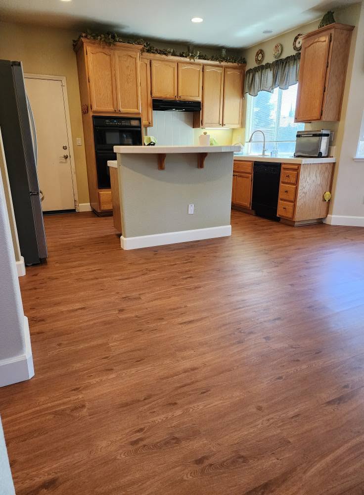 Residential Kitchen — Warm Oak LVP after