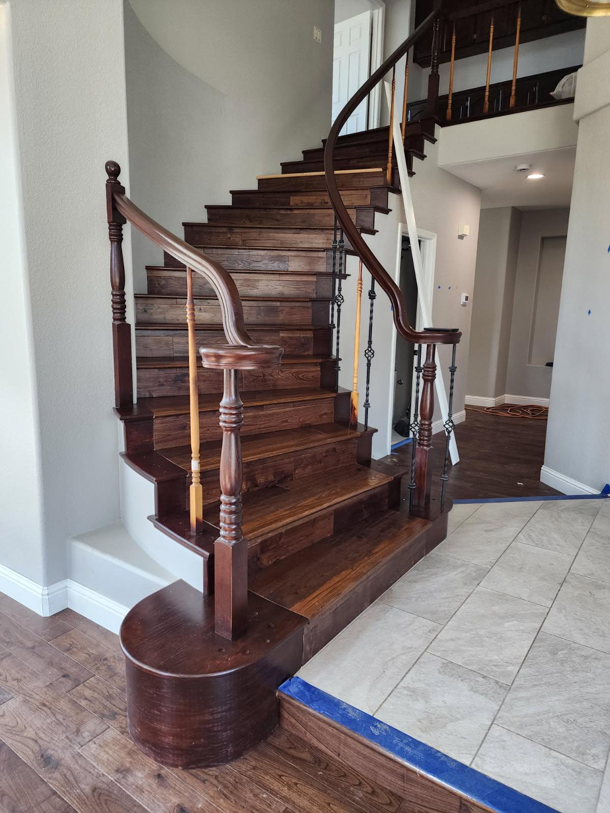 Luxury Curved Staircase — Hardwood after
