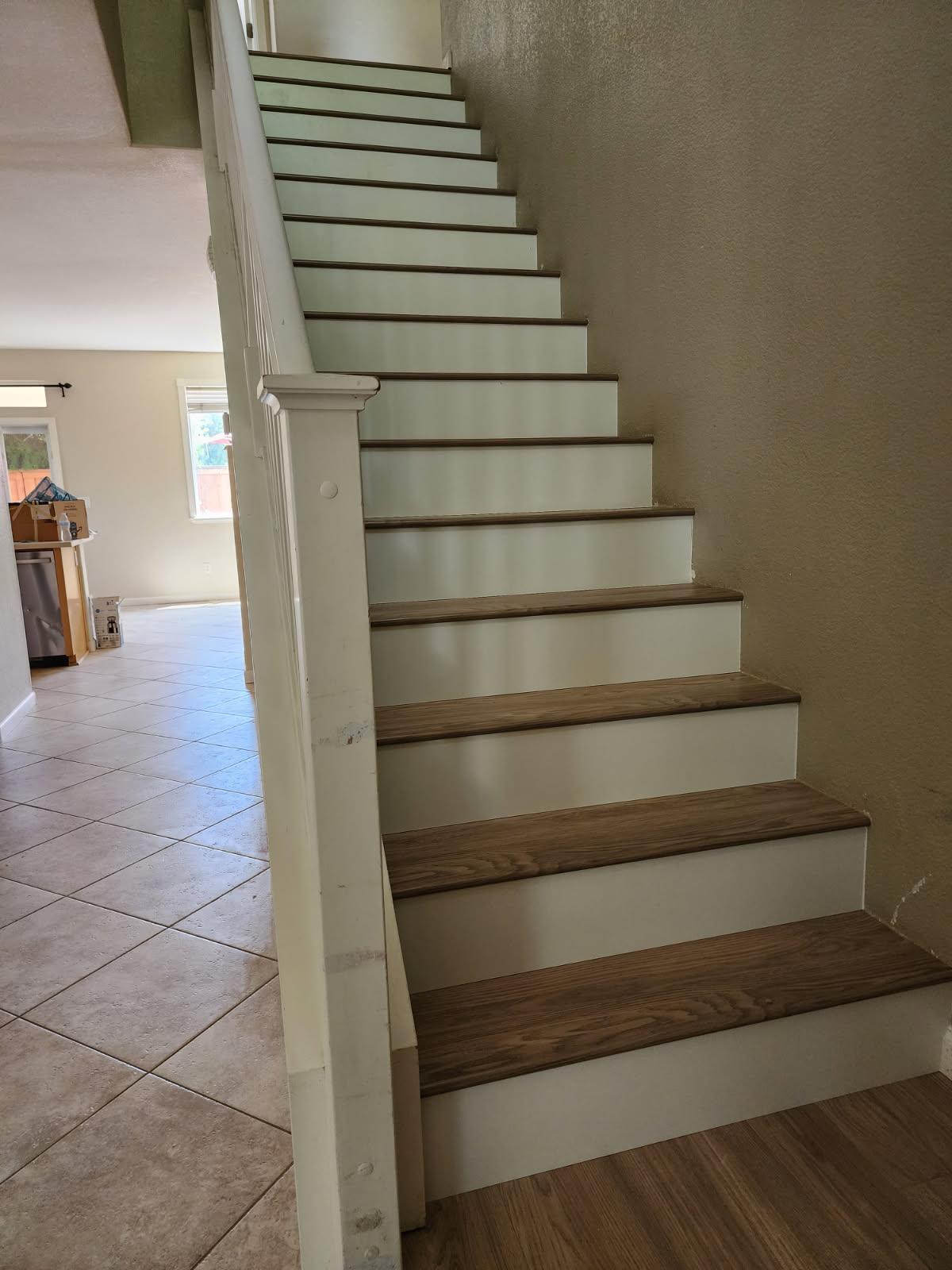 Staircase — Hardwood & White Risers after